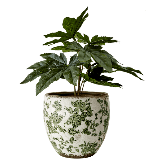 En blomsterpotte fra Affari i keramikk med et vakkert grønt mønster og vintage preg, alle er unike. Fyll potten med dine favoritt planter og urter og dekorer både hjemmet og hytta.